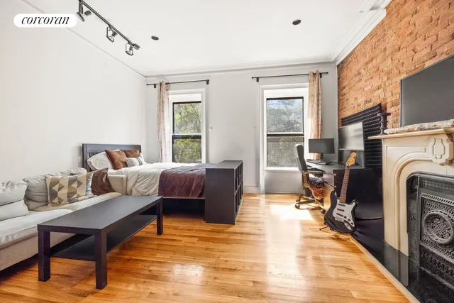 a view of kitchen and wooden floor