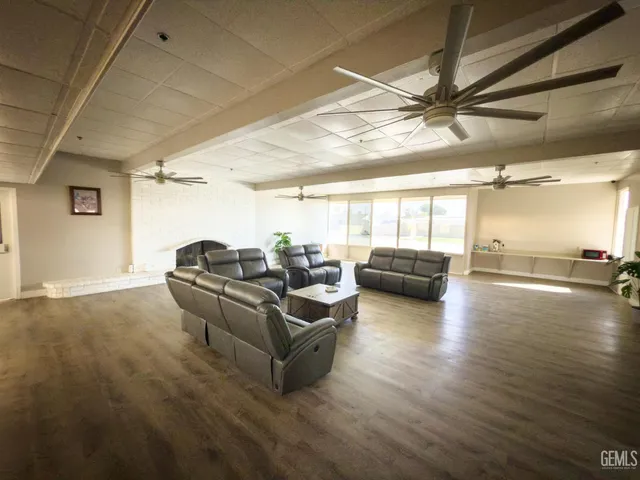 a view of a swimming pool with an outdoor seating