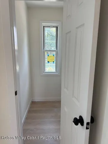 a view of an entryway with a window