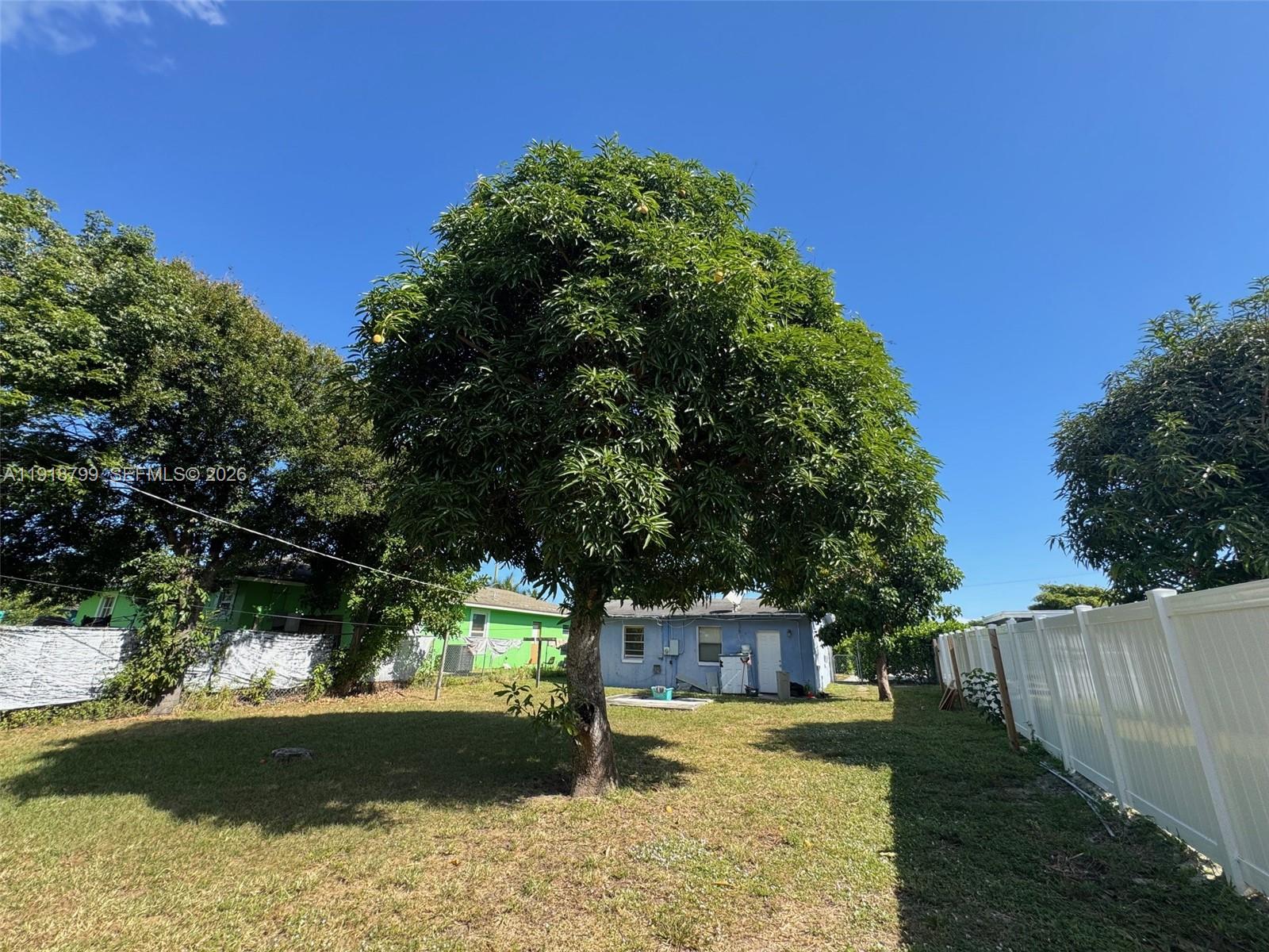 218 Southwest 11th Avenue Delray Beach, FL 33444 - Photo 4 of 7 a view of a backyard