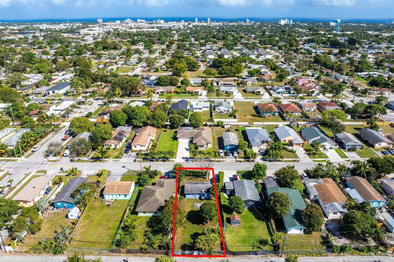 218 Southwest 11th Avenue Delray Beach, FL 33444 - Photo 6 of 7 an aerial view of residential houses with outdoor space