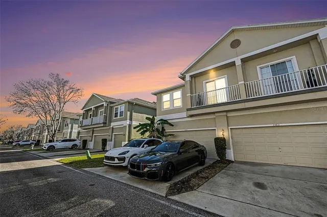 a car parked in front of a house