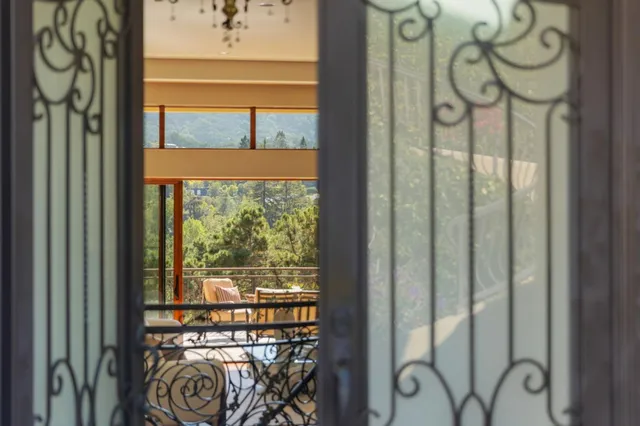 a view of a entryway door with wooden floor