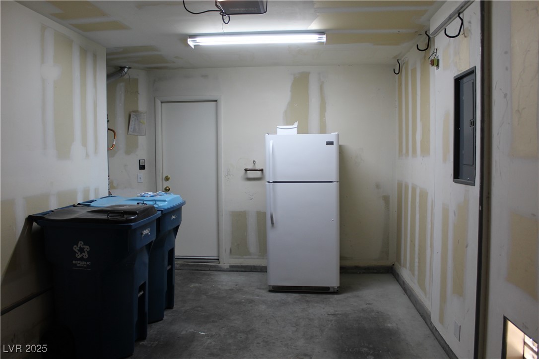 Undisclosed Address Las Vegas, NV 89129 - Photo 12 of 26 Kitchen with concrete flooring, electric panel, an
