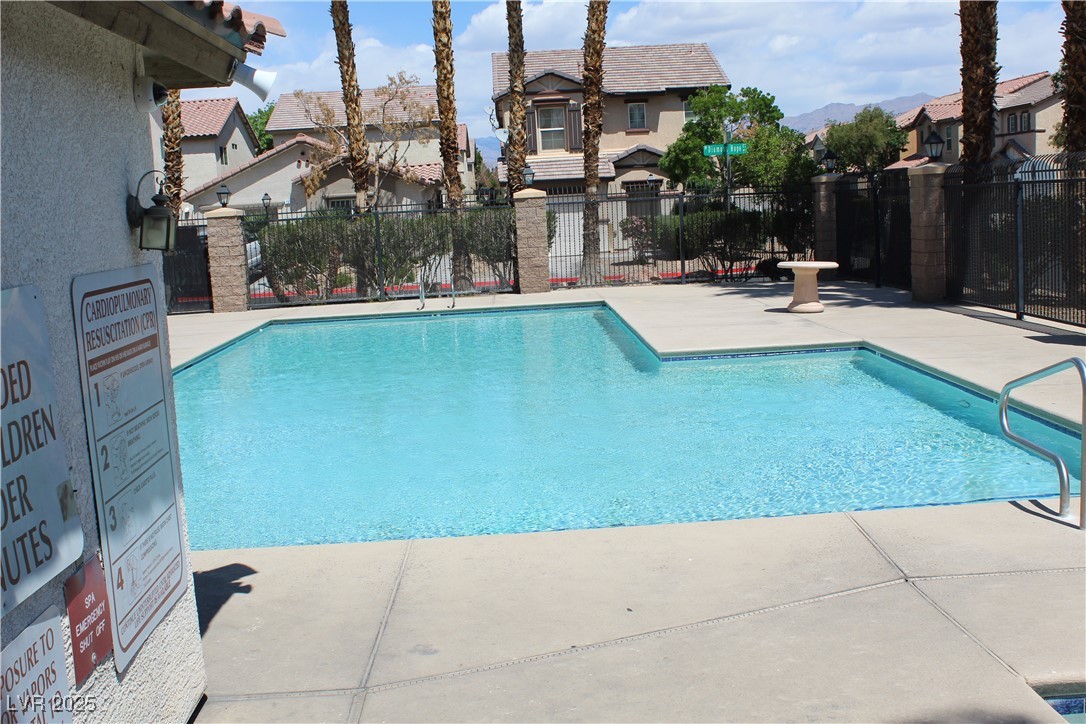 Undisclosed Address Las Vegas, NV 89129 - Photo 26 of 26 Pool featuring a residential view, a patio, and fe