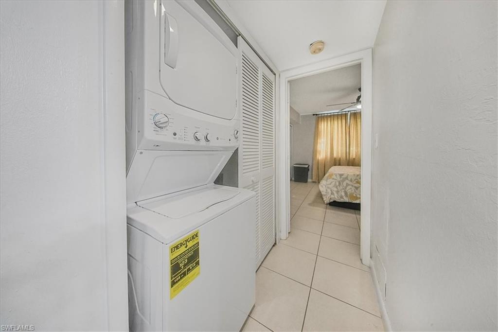 3170 Seasons Way, Unit 802 Estero, FL 33928 - Photo 16 of 31 a utility room with dryer and washer