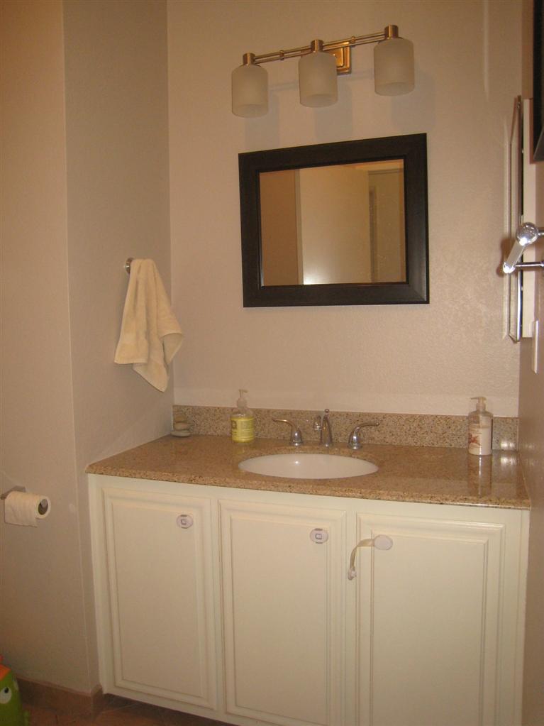 334 North Rice Road Ojai, CA 93023 - Photo 11 of 18 a bathroom with a sink and a mirror