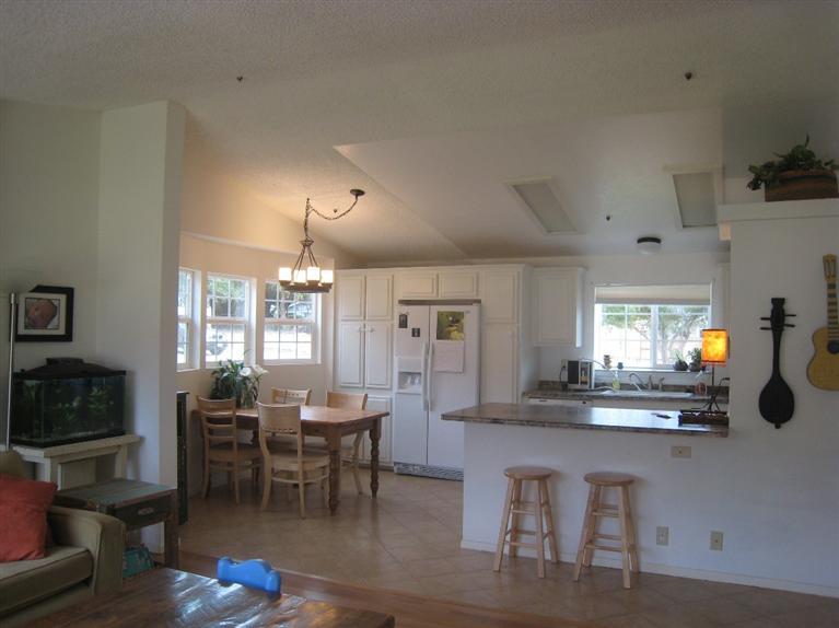 334 North Rice Road Ojai, CA 93023 - Photo 4 of 18 a view of a a dining room with furniture window and wooden floor