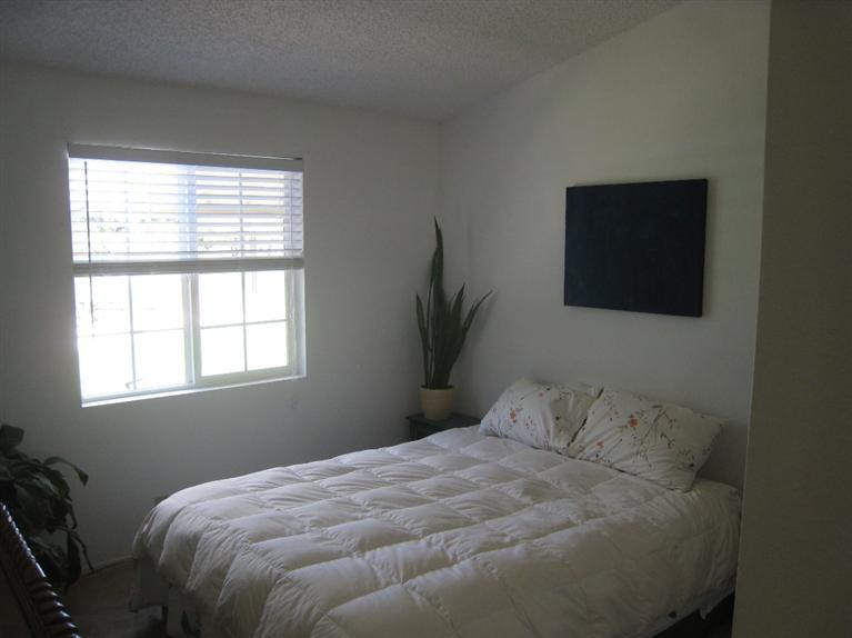 334 North Rice Road Ojai, CA 93023 - Photo 9 of 18 a bedroom with a bed and a window