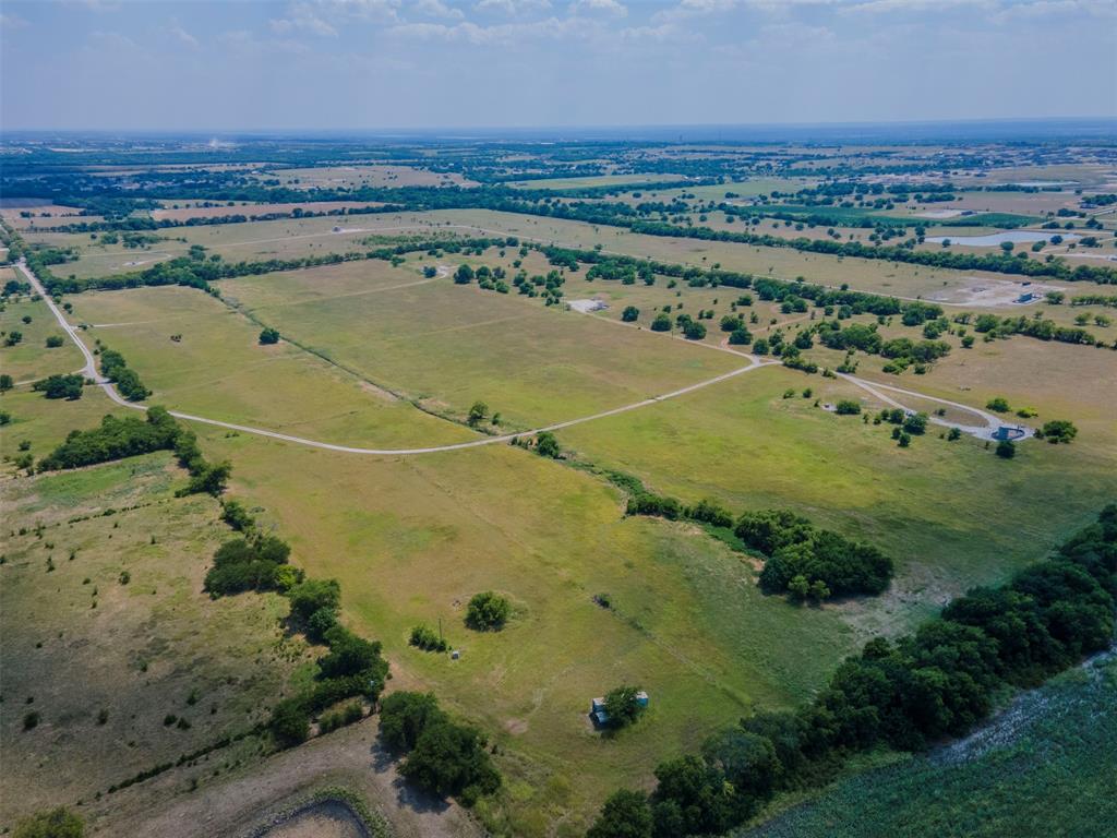 0 Pr 4728 Rhome Tx 76078 Rhome, TX 76078 - Photo 5 of 5 an aerial view of a residential houses with outdoor space
