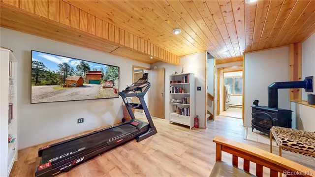 a view of a room with gym equipment