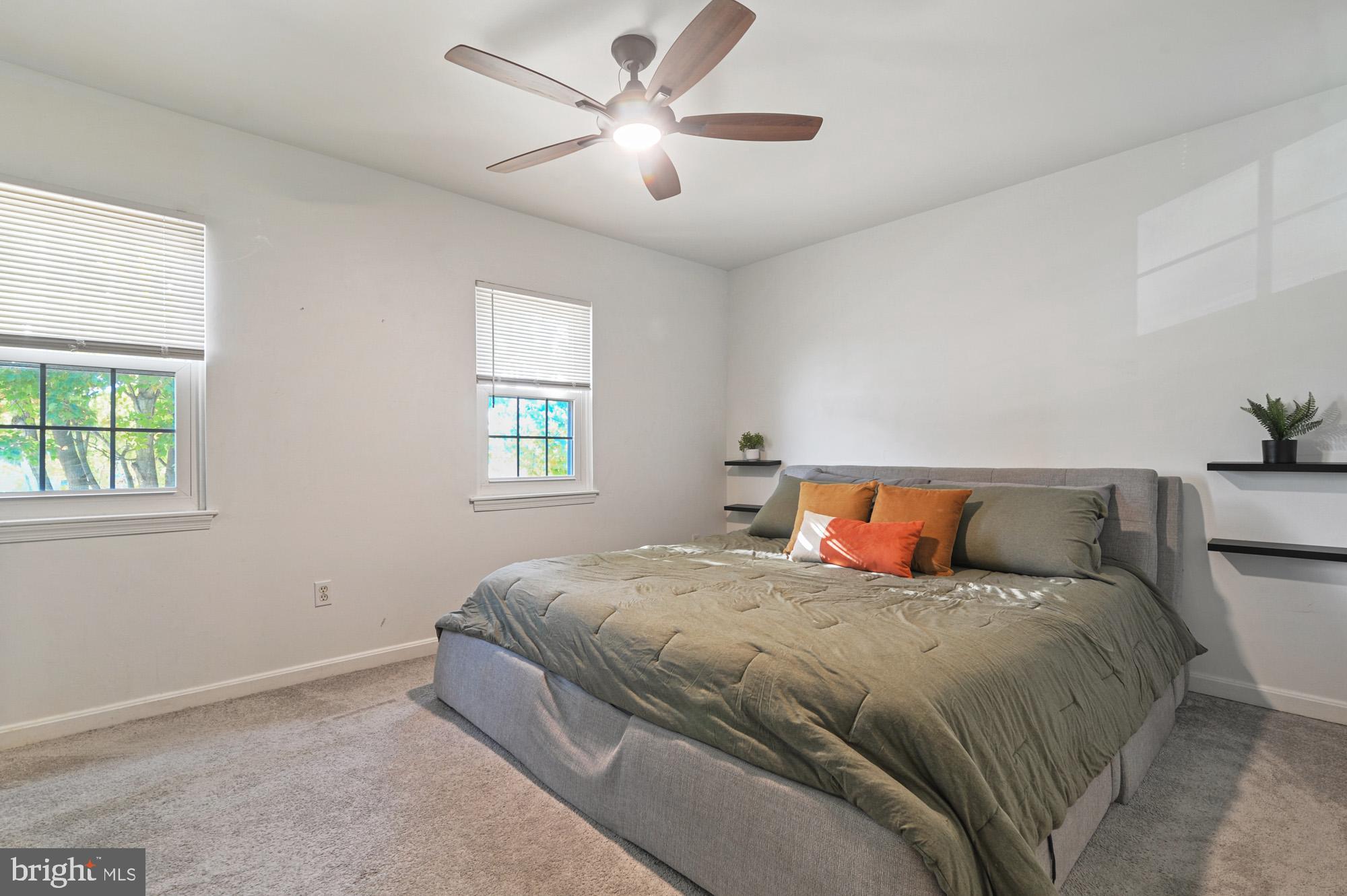 147 Holmes Street Dover, DE 19901 - Photo 11 of 19 a bedroom with a bed and a window