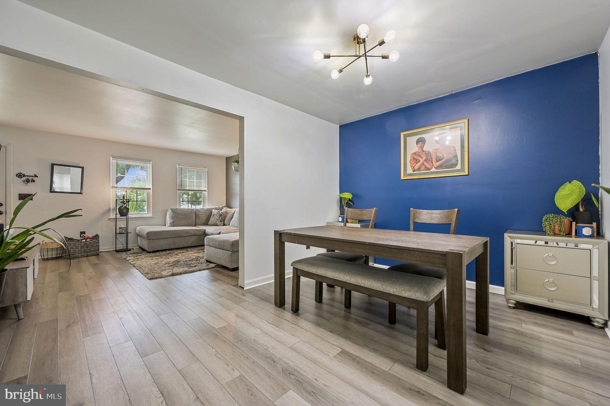 147 Holmes Street Dover, DE 19901 - Photo 5 of 19 a living room with furniture and wooden floor