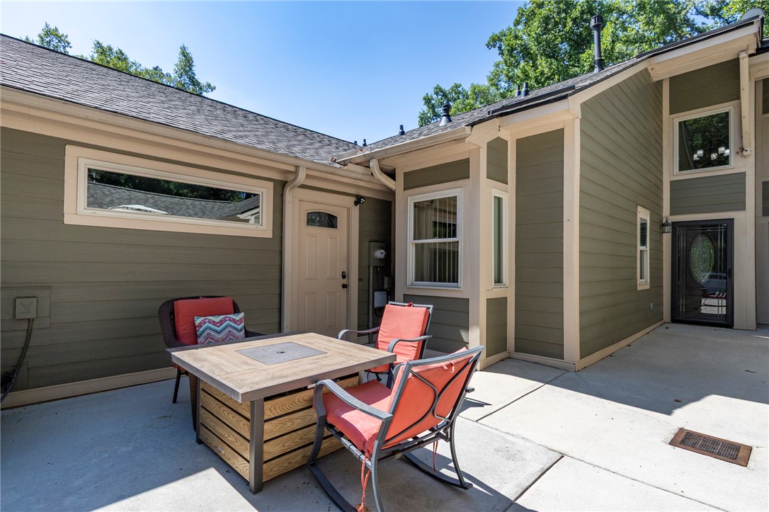 1302 Leeward Road Anderson, SC 29625 - Photo 4 of 50 An inviting private patio awaits, perfect for outdoor relaxation and entertaining guests.