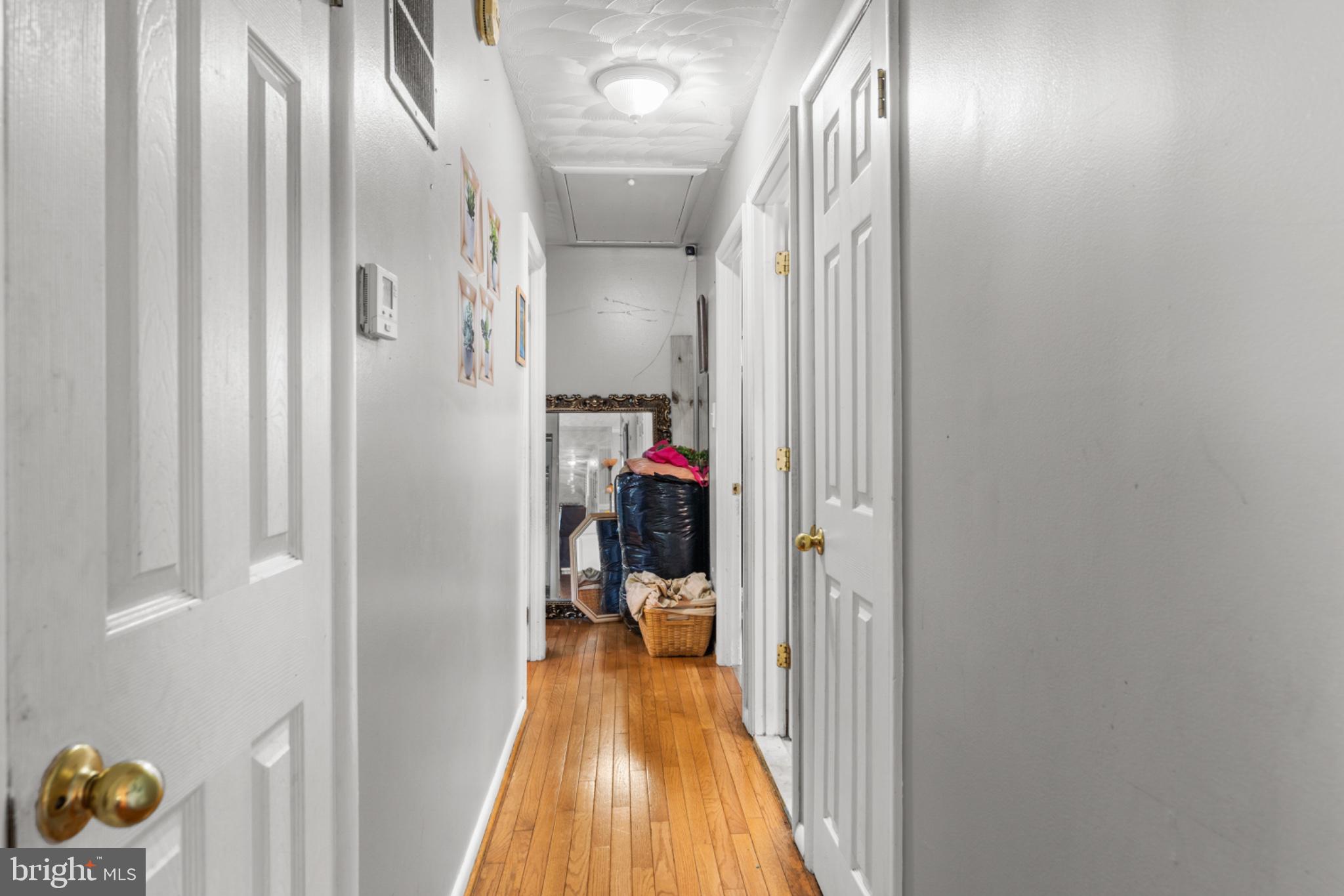 6816 Pepper Street Capitol Heights, MD 20743 - Photo 3 of 12 Bright and inviting hallway retreat.