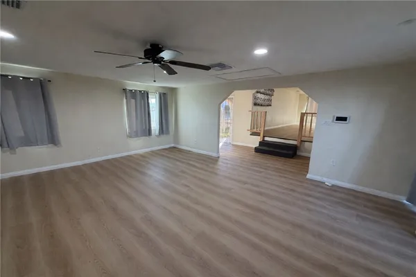 a view of livingroom with furniture and wooden floor