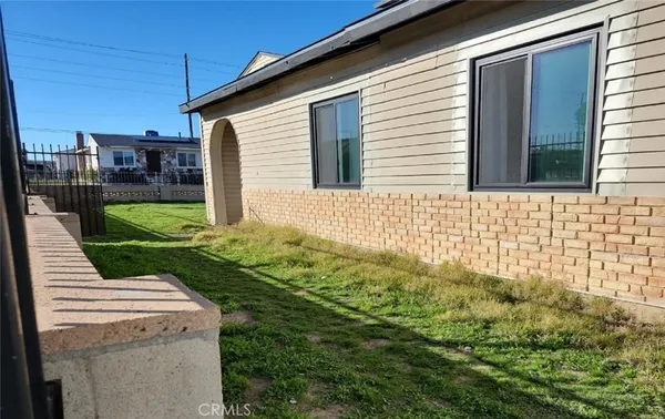a view of a backyard with plants