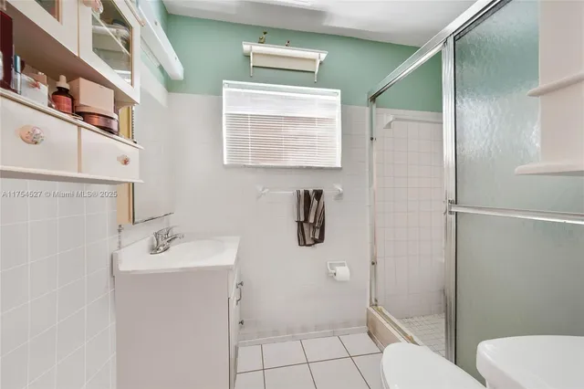 a view of a tree in a yard