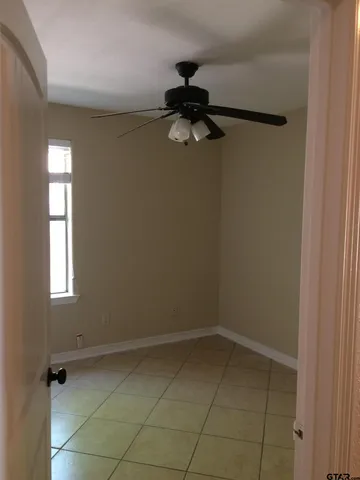 a view of a room with a window