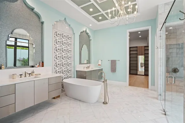 a view of an empty room with a floor to ceiling window and an outdoor view