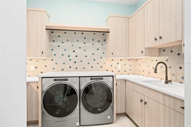 a bedroom with a bed and a cabinets