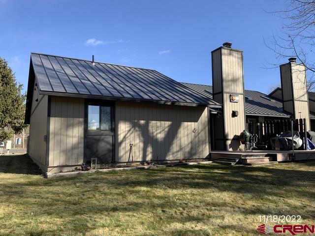 169 Camino Del Rio, Unit 8 Gunnison, CO 81230 - Photo 1 of 45 a view of a house with swimming pool