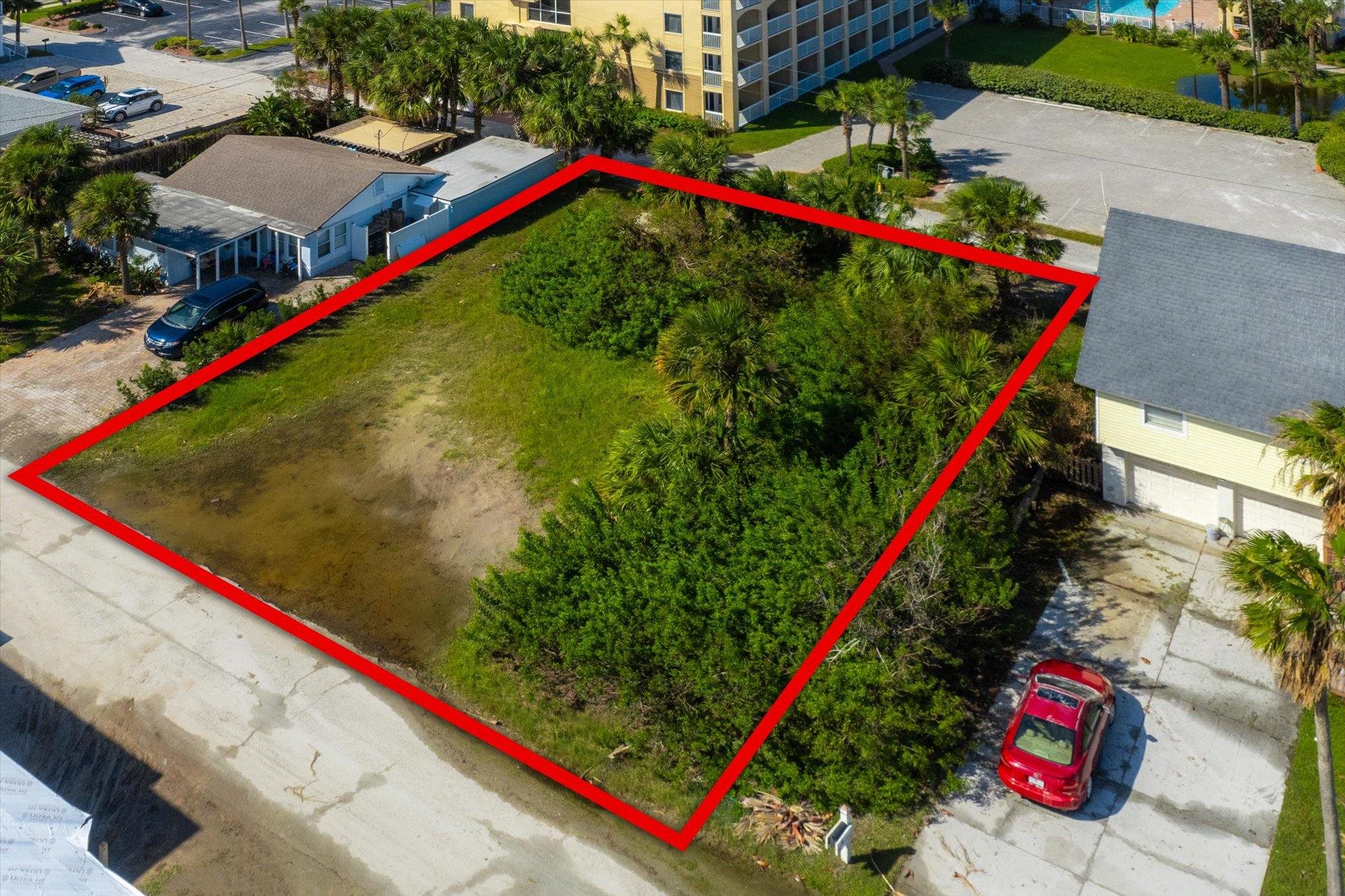 8 13th Street St. Augustine Beach, FL 32080 - Photo 12 of 50 a view of swimming pool with red and white wooden bench