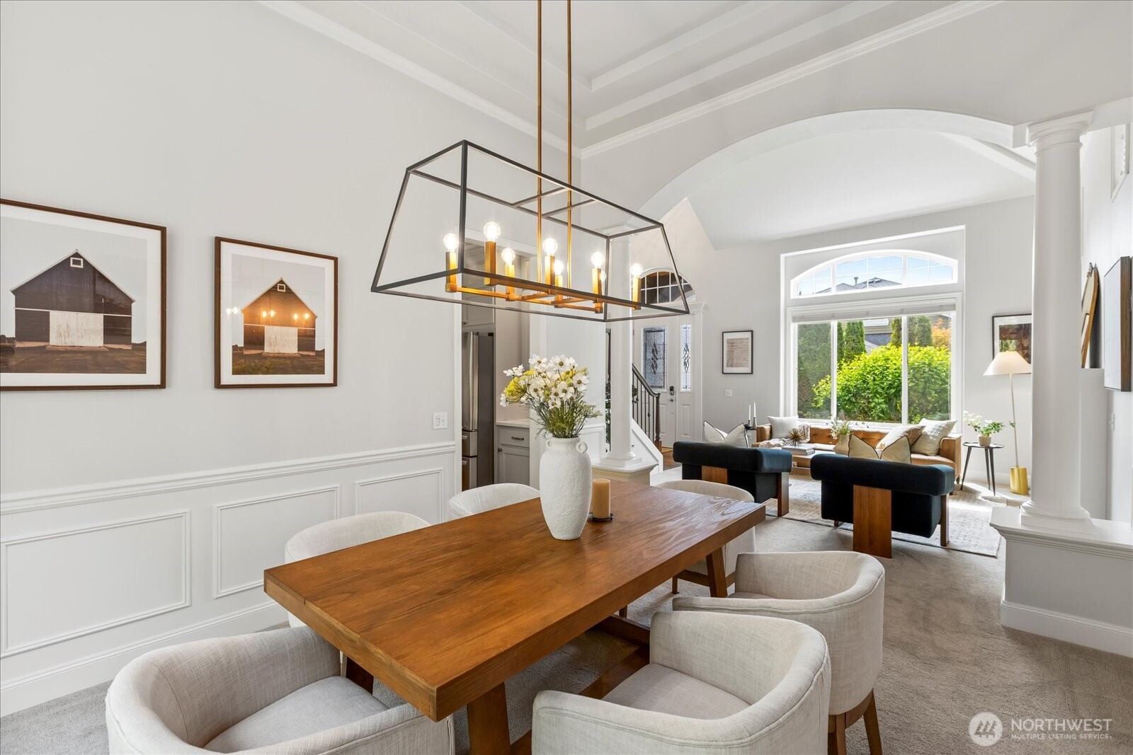 4426 219th Place Southeast Bothell, WA 98021 - Photo 14 of 40 a dining room with furniture a window and a chandelier