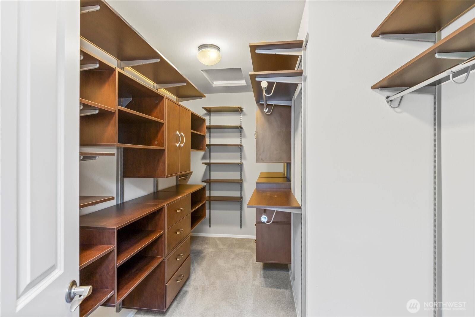 4426 219th Place Southeast Bothell, WA 98021 - Photo 25 of 40 a view of walk in closet with empty racks