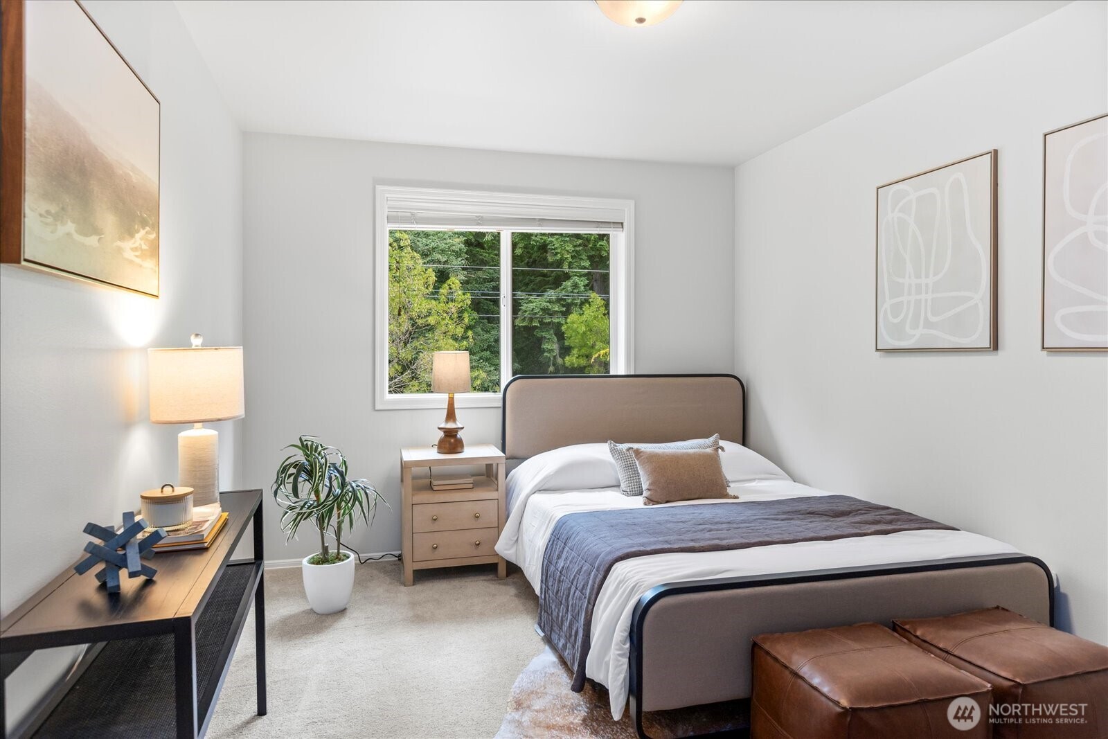 4426 219th Place Southeast Bothell, WA 98021 - Photo 27 of 40 a bedroom with a bed and a chair
