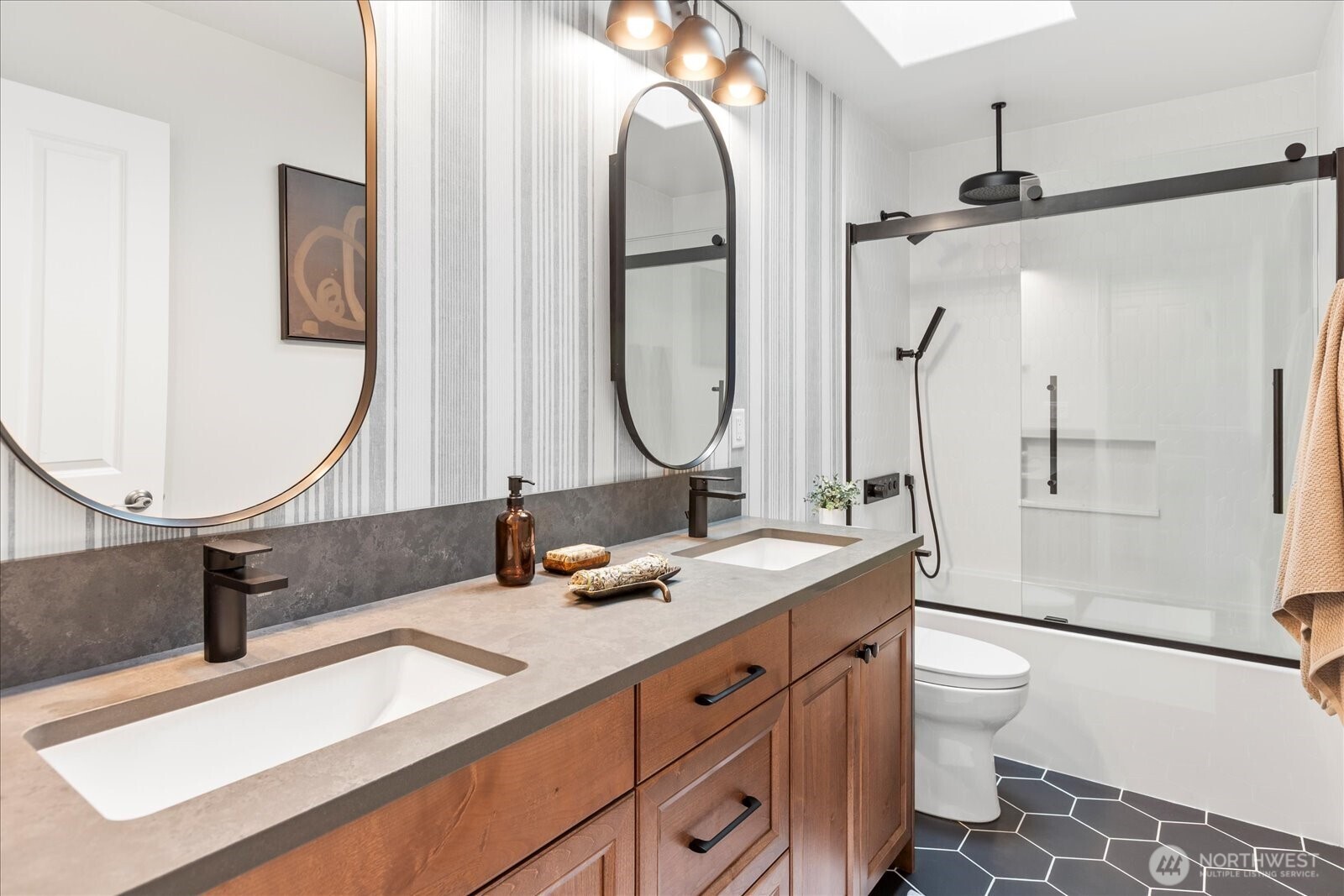 4426 219th Place Southeast Bothell, WA 98021 - Photo 28 of 40 a bathroom with a double vanity sink mirror and toilet