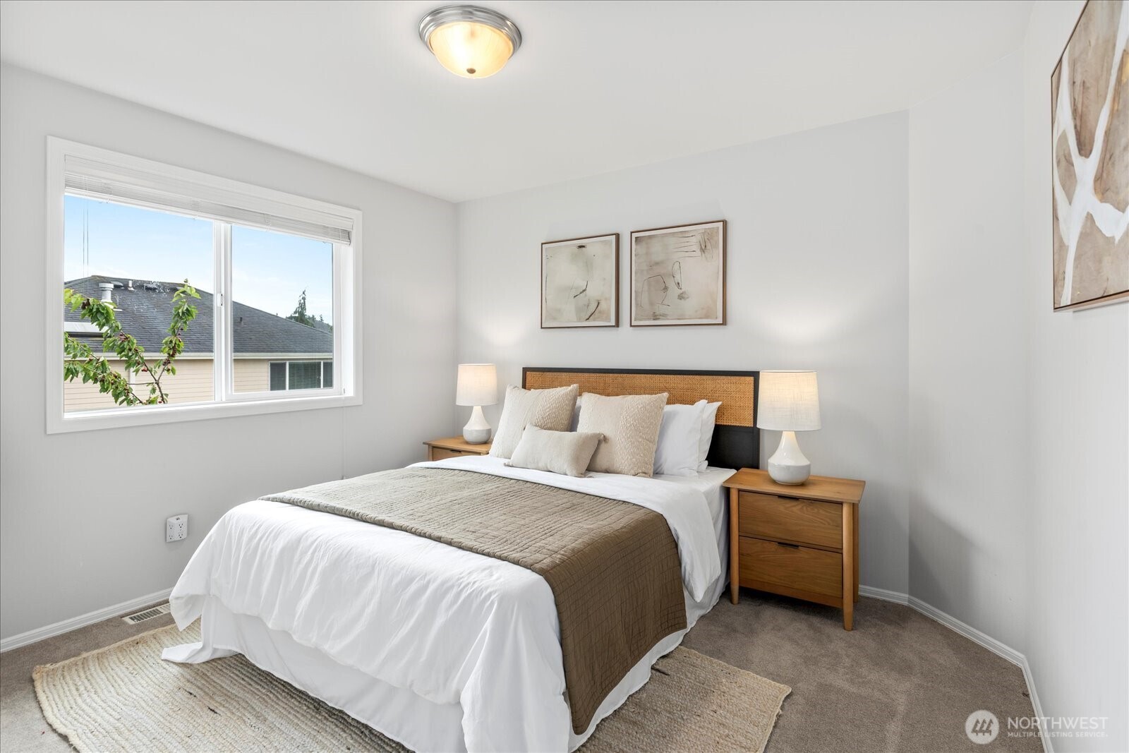 4426 219th Place Southeast Bothell, WA 98021 - Photo 29 of 40 a bedroom with a bed and a window