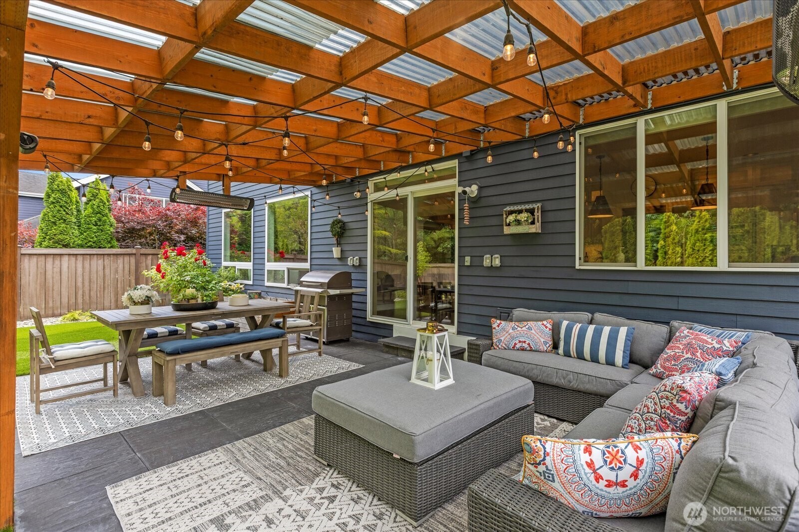 4426 219th Place Southeast Bothell, WA 98021 - Photo 34 of 40 a outdoor living space with patio furniture and a potted plant