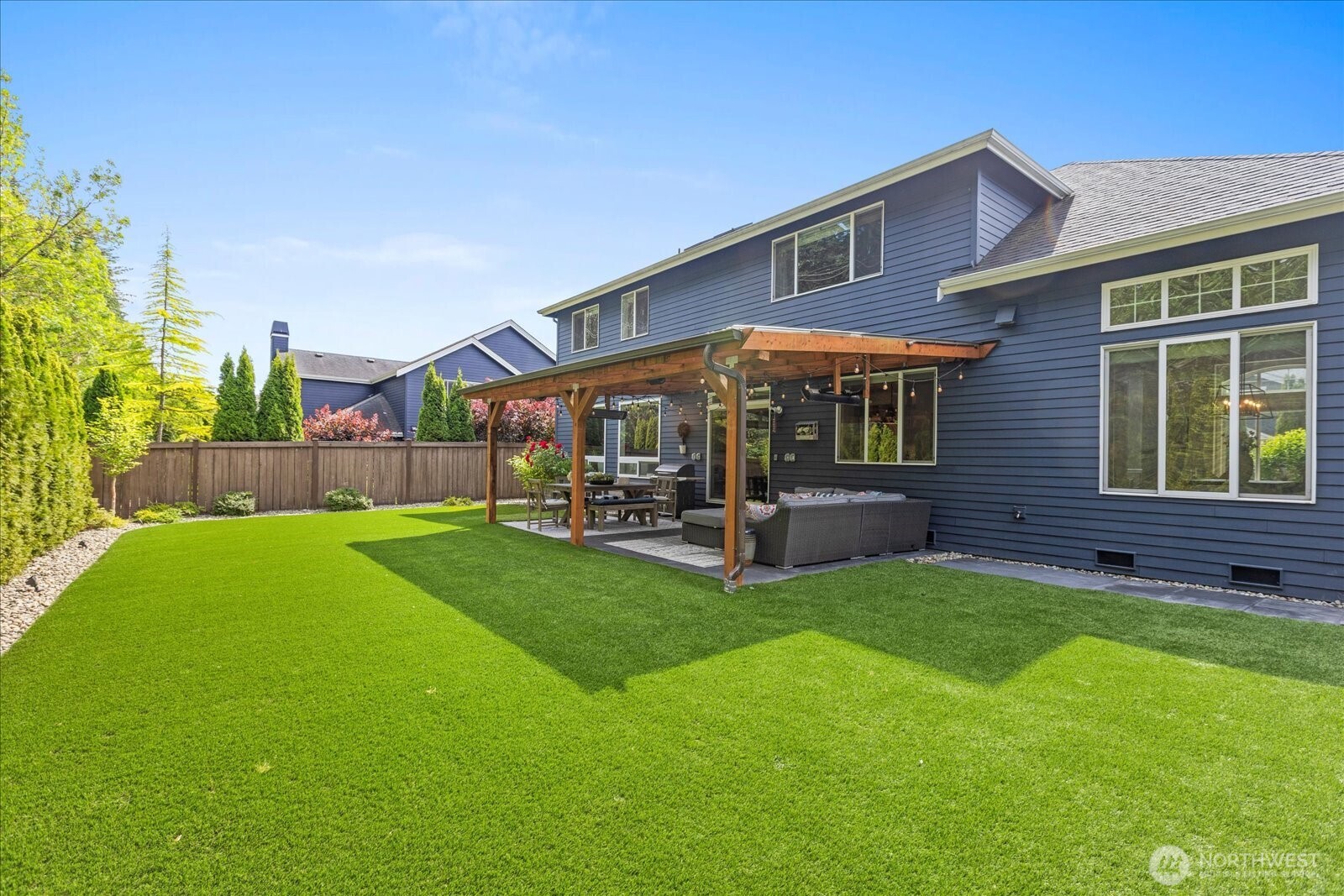4426 219th Place Southeast Bothell, WA 98021 - Photo 36 of 40 a view of a house with a yard porch and sitting area