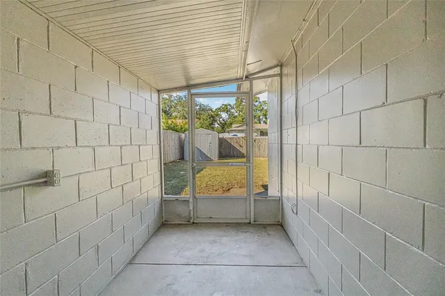 a view of a house with a yard and garage