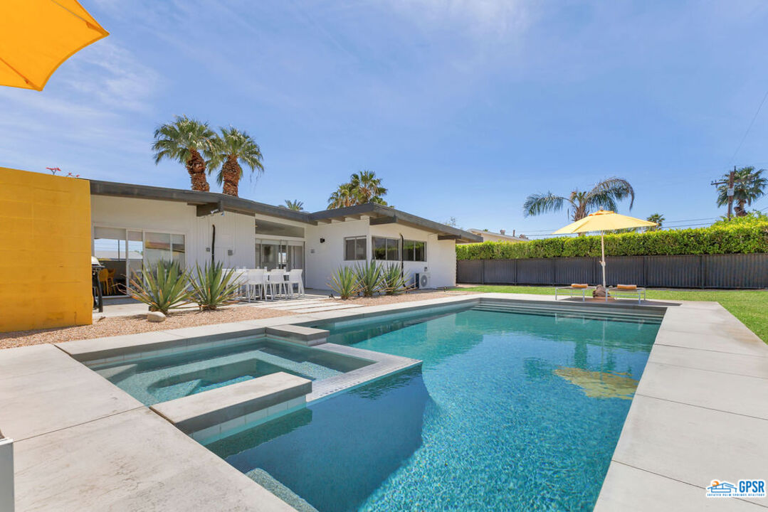 2267 North San Antonio Road Palm Springs, CA 92262 - Photo 20 of 60 a view of house with swimming pool outdoor seating