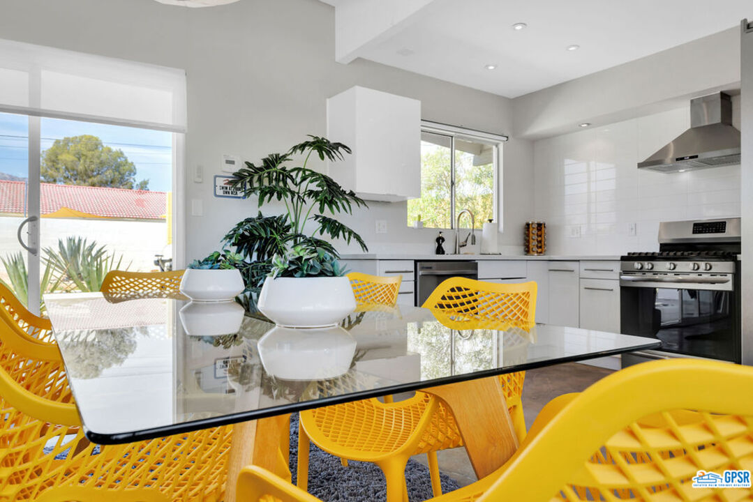 2267 North San Antonio Road Palm Springs, CA 92262 - Photo 2 of 60 a view of a living room and kitchen