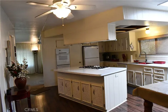 a bedroom with a bed and a table