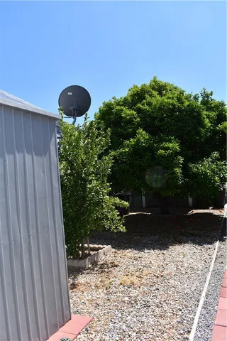 a living room with lots of furniture and a chandelier
