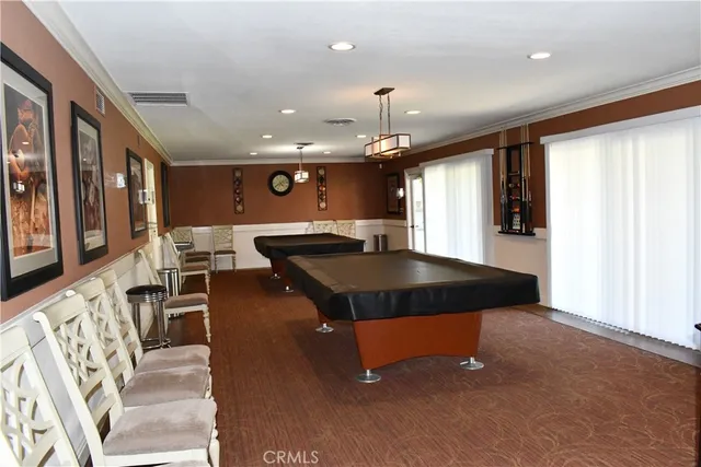 a view of a lake with houses in the back