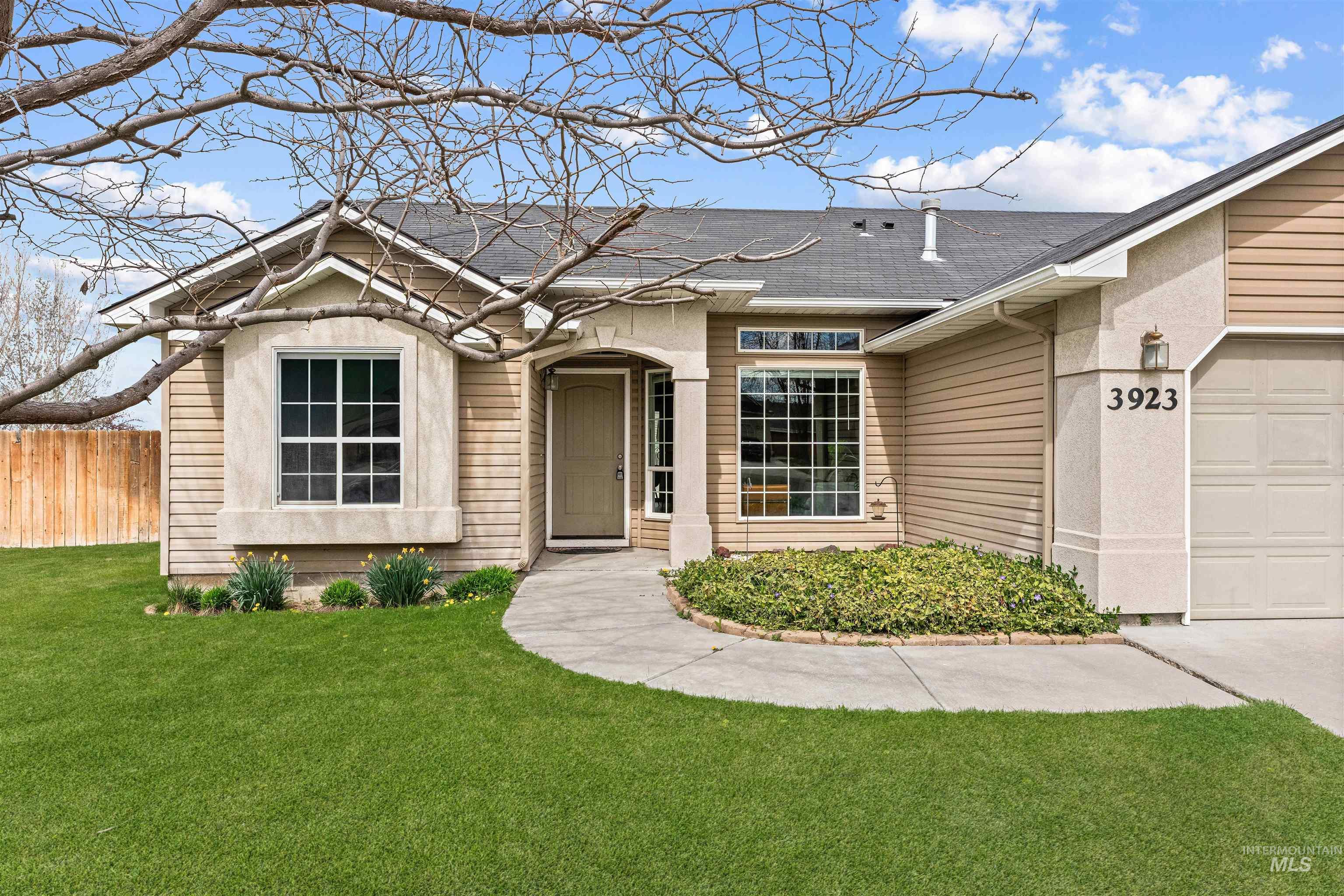 3923 Chatham Court Caldwell, ID 83607 - Photo 1 of 32 Ranch-style home with a garage and a shingled roof