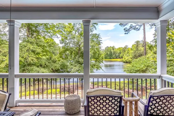 a kitchen with stainless steel appliances granite countertop a stove refrigerator and cabinets