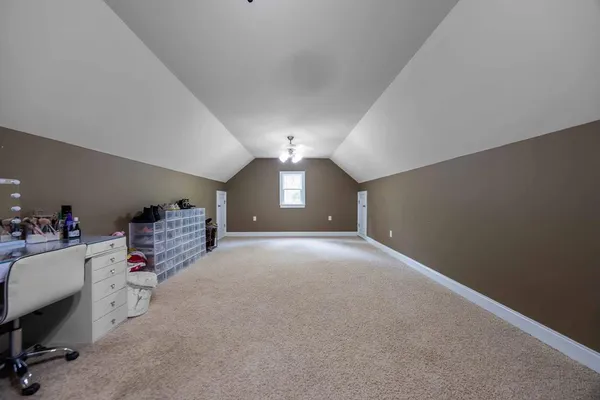 a view of a backyard with a garden