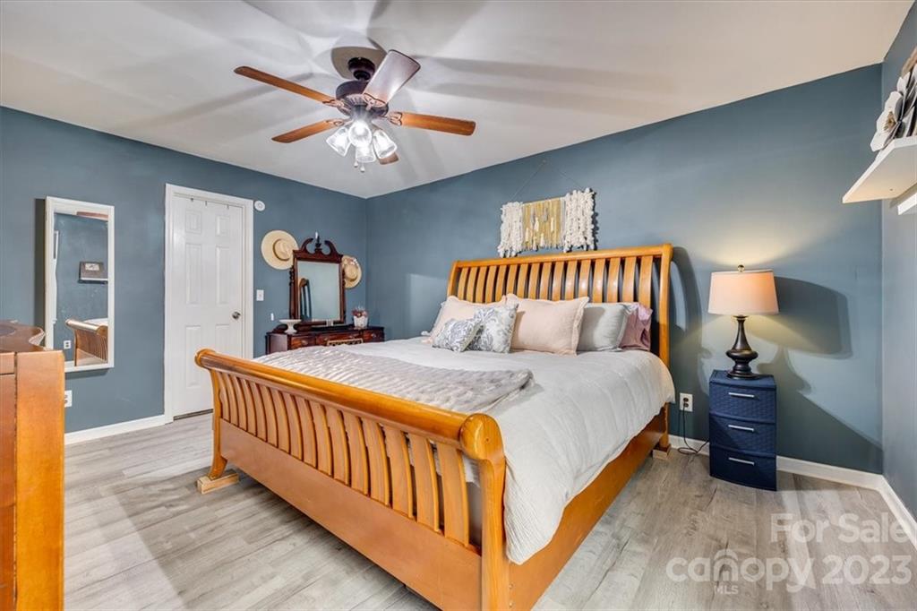 102 Banksridge Road Fort Mill, SC 29715 - Photo 17 of 32 a bedroom with a bed and window
