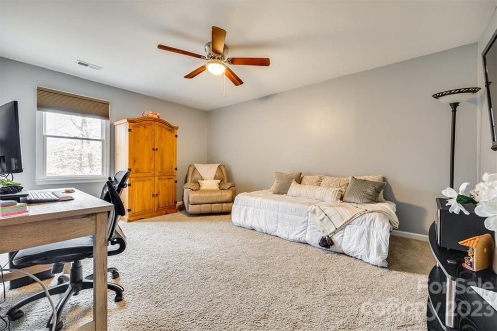 102 Banksridge Road Fort Mill, SC 29715 - Photo 23 of 32 a bedroom with bed and a window