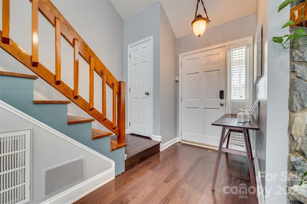 102 Banksridge Road Fort Mill, SC 29715 - Photo 3 of 32 a view of entryway and hall with wooden floor