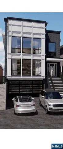 a black and white photo of a living room