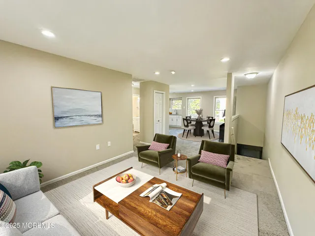 a living room with furniture and a rug