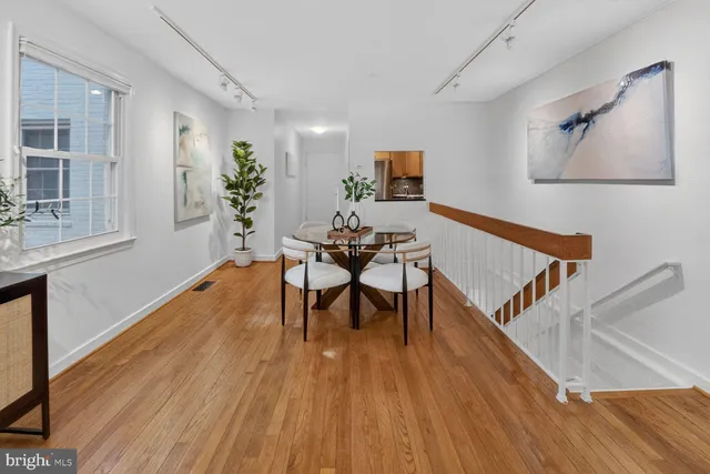 a view of a livingroom with furniture and wooden floor
