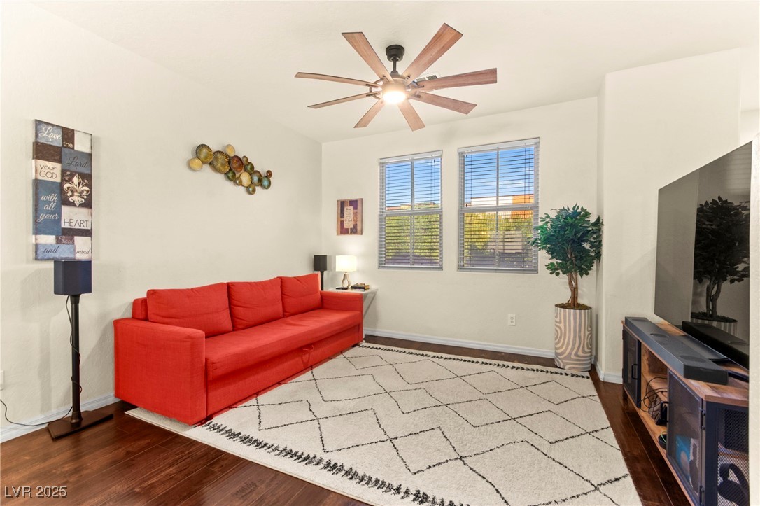 4650 Ranch House Road, Unit 143 North Las Vegas, NV 89031 - Photo 3 of 54 Living area featuring ceiling fan and wood finished floors